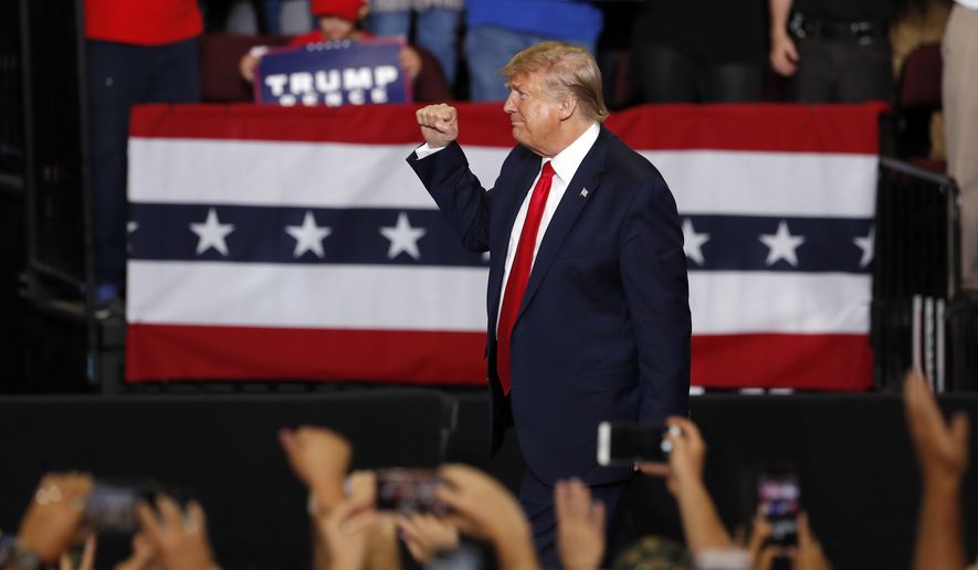 President Donald Trump is cheered by supporters upon his arrival to a campaign rally at the Santa Ana Star Center, Monday, Sept. 16, 2019, in Rio Rancho, N.M. (AP Photo/Andres Leighton)