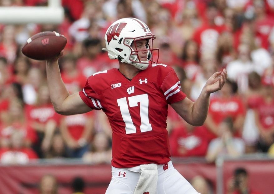 Wisconsin's Jack Coan throws during the first half of an NCAA college football game against Central Michigan Saturday, Sept. 7, 2019, in Madison, Wis. (AP Photo/Morry Gash)