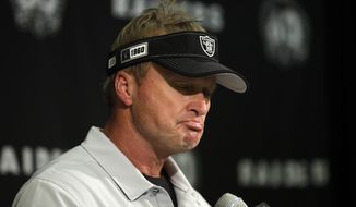 Oakland Raiders head coach Jon Gruden listens to questions during a news conference at the end of an NFL football game against the Kansas City Chiefs Sunday, Sept. 15, 2019, in Oakland, Calif. Kansas City won the game 28-10. (AP Photo/Ben Margot)