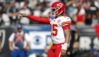Kansas City Chiefs quarterback Patrick Mahomes calls out a play during the second half of an NFL football game against the Oakland Raiders Sunday, Sept. 15, 2019, in Oakland, Calif. (AP Photo/D. Ross Cameron)