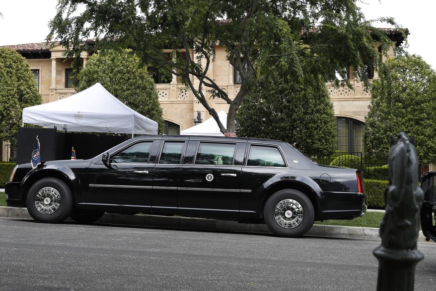 FILE - In this April 5, 2019, file photo, the presidential limousine of President Donald Trump is parked on a hill in front of a private residence in Beverly Hills, Calif., as he meets with supporters during a fundraiser. Trump is set to raise more than $15 million this week during a two-day California fundraising swing. (AP Photo/Jacquelyn Martin, File)