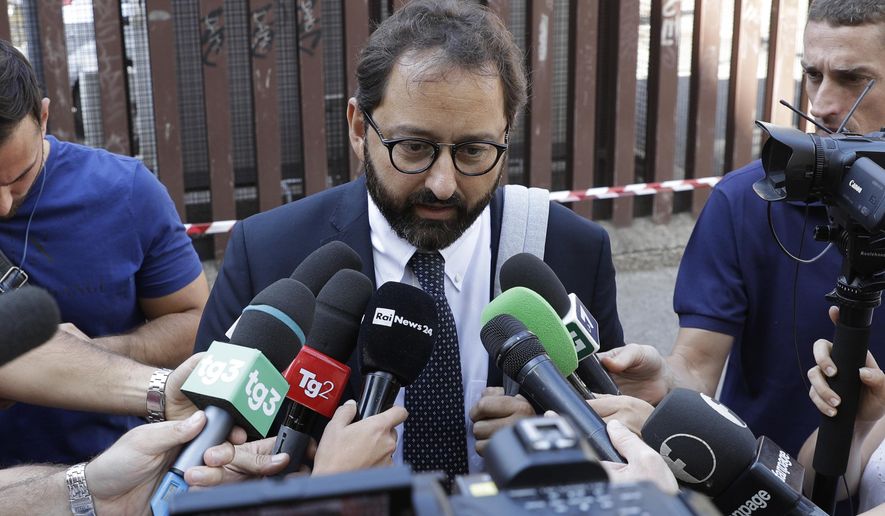 Massimo Ferrandino, lawyer of the widow of police officer Mario Cerciello Rega speaks to reporters outside Rome's courthouse, Monday, Sept. 16, 2019. The lawyers for one of two American teenagers being held in the July slaying of the police officer have dropped a request for their client Gabriel Natale-Hjorth to be released, saying they need more time to study new evidence emerged from the investigation. (AP Photo/Gregorio Borgia)
