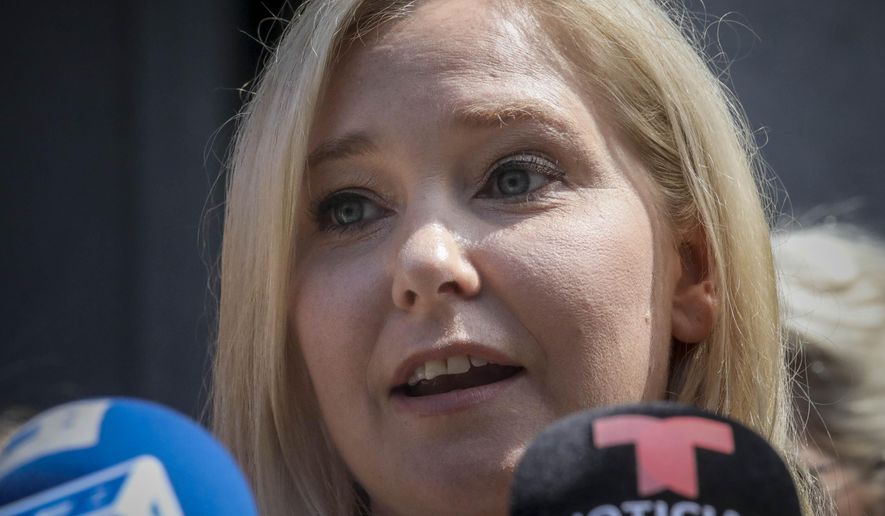 In this Aug. 27, 2019 file photo, Virginia Roberts Giuffre, a sexual assault victim, speaks during a press conference outside a Manhattan court in New York. Epstein&#39;s accusers have suffered a setback in seeking money from the government over a plea deal that spared the financier a lengthy prison term. U.S. District Judge Kenneth Marra ruled on Monday, Sept. 16, 2019 that the government doesn&#39;t owe them money for it. (AP Photo/Bebeto Matthews, File)