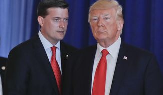 In this Aug. 12, 2017, photo, Rob Porter, left, White House Staff Secretary, speaks to President Donald Trump after Trump made remarks regarding the ongoing situation in Charlottesville, Va., at Trump National Golf Club in Bedminister, N.J. The White House has instructed Porter and another former aide to President Donald Trump not to appear at a House Judiciary Committee hearing Tuesday, Sept. 17, 2019, saying Porter and Rick Dearborn are &amp;quot;absolutely immune&amp;quot; from testifying at what the panel is calling its first impeachment hearing. (AP Photo/Pablo Martinez Monsivais)