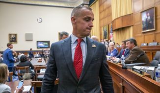 Corey Lewandowski, former campaign manager for President Donald Trump, leaves the House Judiciary Committee room during a break in his testimony, Tuesday, Sept. 17, 2019, on Capitol Hill in Washington. (AP Photo/J. Scott Applewhite) ** FILE **