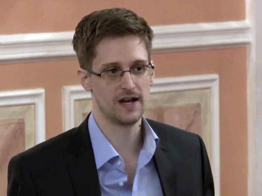 In this Oct. 11, 2013, file image made from video and released by WikiLeaks, former National Security Agency systems analyst Edward Snowden speaks in Moscow. (AP Photo) 