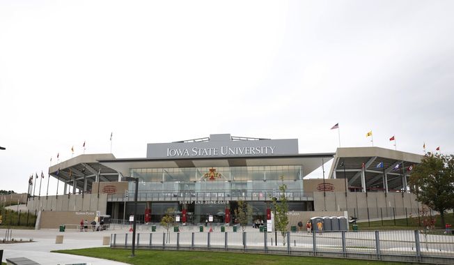 FILE - In this Aug. 31, 2019, file photo, Iowa State&#x27;s Jack Trice Stadium is shown before an NCAA college football game against Northern Iowa, in Ames. Iowa State President Wendy Wintersteen has transferred oversight of the Iowa State Center, a series of buildings near Hilton Coliseum and Jack Trice Stadium, to the athletic department. It has also tabbed athletic director Jamie Pollard to be the head of a process to redesign the area as an “arts, culture, and community district.” The school announced the plan on Tuesday, Sept. 17, 2019, saying that Pollard and Iowa State Research Park President Rick Sanders will lead a feasibility study to build a multi-use development district between Hilton and Jack Trice _ which is now largely just parking lots. The proposed plan would also look into relocating commuter and football game day parking to a new paved parking area east of the stadium. (AP Photo/Matthew Putney, File)