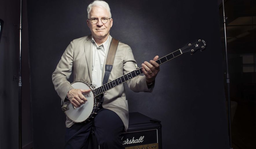 In this Sept. 2, 2015 photo, Steve Martin poses for a portrait with his banjo in New York. Martin said the Steve Martin Prize for Excellence in Banjo and Bluegrass, which comes with a $50,000 prize and a sculpture, is in danger of disappearing because he and the prize board members are overwhelmed by the sheer number of qualified musicians. Martin hopes some entity might take over administrating the prize. (Photo by Victoria Will/Invision/AP)