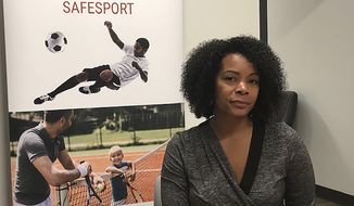 Ju&#39;Riese Colon, the CEO for the U.S. Center for SafeSport, talks about the challenges facing her organization at their headquarters in Denver, Monday, Sept. 16, 2019. The center is receiving 55 percent more sex-abuse reports this year than in 2018, leading to a debate over whether the Olympic movement or federal government should shoulder the increasing cost of keeping athletes safe. (AP Photo/Eddie Pells)