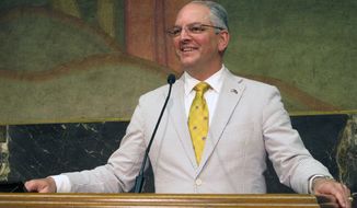 FILE - In this June 6, 2019 file photo, Louisiana&#39;s Democratic Gov. John Bel Edwards smiles as he describes the end of a legislative session that saw his teacher pay raise and education spending plans win final passage, in Baton Rouge, La. Edwards moved quickly to expand Medicaid when he took office in 2016. His state is the only one in the Deep South to embrace that signature piece of Barack Obama’s health law. And the Medicaid expansion program isn’t going anywhere even if Edwards is ousted by a Republican in this fall’s election. Instead, his two main opponents Ralph Abraham and Eddie Rispone are attacking Edwards’ hallmark achievement on management, not the program’s existence. (AP Photo/Melinda Deslatte, File)