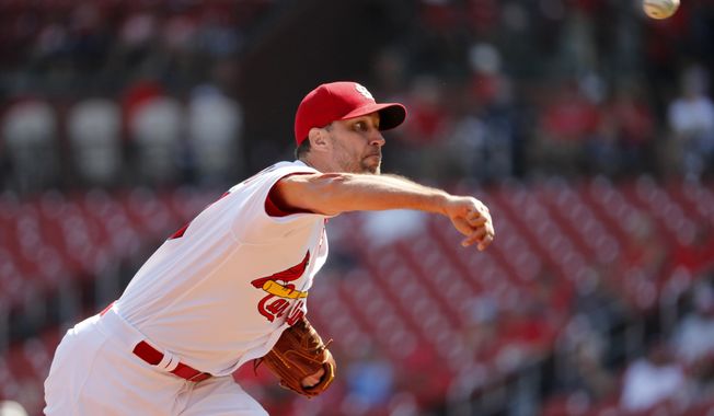 St. Louis Cardinals starting pitcher Adam Wainwright throws during the first inning of a baseball game against the Washington Nationals Wednesday, Sept. 18, 2019, in St. Louis. (AP Photo/Jeff Roberson)