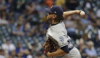 San Diego Padres starting pitcher Dinelson Lamet throws during the first inning of a baseball game against the Milwaukee Brewers Wednesday, Sept. 18, 2019, in Milwaukee. (AP Photo/Morry Gash)