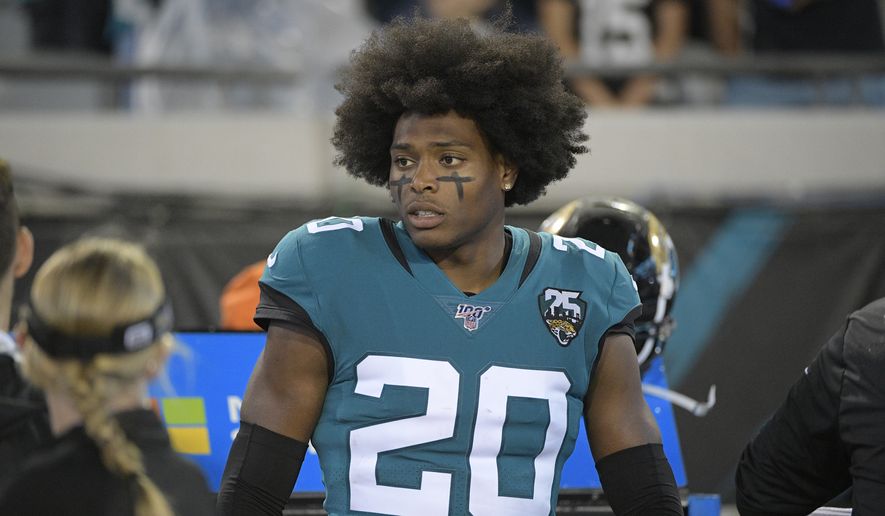 Jacksonville Jaguars cornerback Jalen Ramsey (20) on the bench during the first half of an NFL football game against the Tennessee Titans Thursday, Sept. 19, 2019, in Jacksonville, Fla. (AP Photo/Phelan Ebenhack) ** FILE **