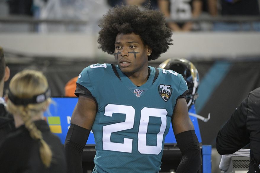 Jacksonville Jaguars cornerback Jalen Ramsey (20) on the bench during the first half of an NFL football game against the Tennessee Titans Thursday, Sept. 19, 2019, in Jacksonville, Fla. (AP Photo/Phelan Ebenhack) ** FILE **