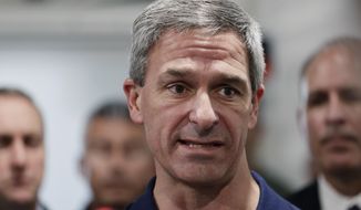 Acting director of U.S. Citizenship and Immigration Services Ken Cuccinelli talks during a walk through of the Migration Protection Protocols Immigration Hearing Facility, Tuesday, Sept. 17, 2019, in Laredo, Texas. Cuccinelli is emerging as the public face of the president’s hard-line immigration policies. (AP Photo/Eric Gay)
