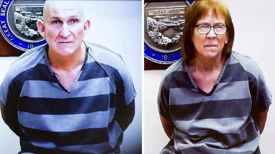 Blane Barksdale, left, and Susan Barksdale, right, are seen during a video arraignment in Pima County Superior Court, on Thursday, Sept. 19, 2019, Tucson, Ariz. The Barksdales, wanted in connection with a homicide in Tucson, had escaped custody during transport from upstate New York back to Tucson. They were recaptured on Sept. 11. (Rebecca Sasnett/Arizona Daily Star via AP, Pool)