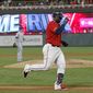 Minnesota Twins&#39; Miguel Sano jogs home on a solo home run off Kansas City Royals pitcher Mike Montgomery, background, during the third inning of a baseball game Thursday, Sept. 19, 2019, in Minneapolis. (AP Photo/Jim Mone)