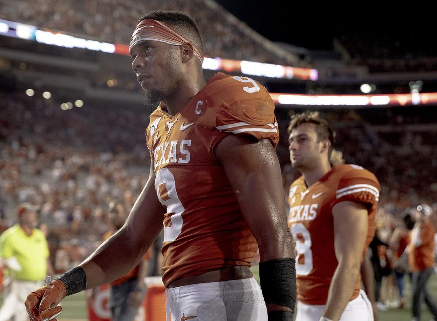 Texas wide receiver Collin Johnson (9) walks off the field following Texas 45-38 loss to against LSU in an NCAA football game on Saturday, Sept. 7, 2019, in Austin, Texas. (Nick Wagner/American-Statesman via AP)