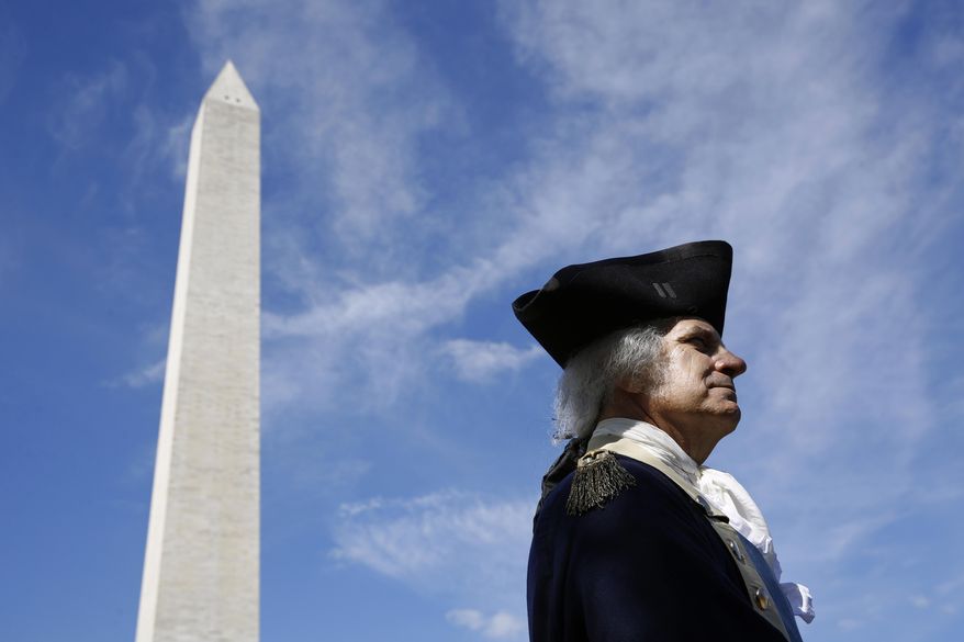 John Lopes, playing the part of President George Washington, stands near the Washington Monument following a ribbon-cutting ceremony with first lady Melania Trump to re-open the monument, Thursday, Sept. 19, 2019, in Washington. The monument has been closed to the public for renovations since August 2016. (AP Photo/Patrick Semansky)