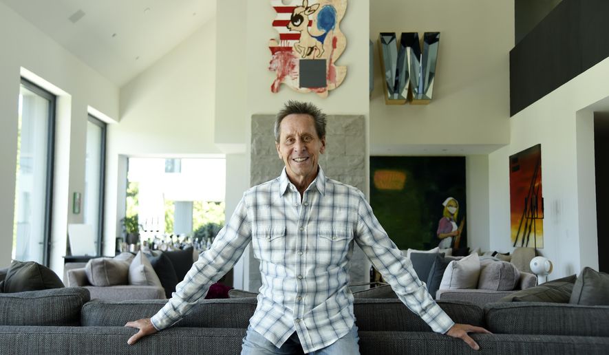 This Aug. 30, 2019 photo shows producer Brian Grazer posing for a portrait at his home in Santa Monica, Calif., to promote his book &amp;quot;Face to Face: The Art of Human Connection.&amp;quot; (Photo by Chris Pizzello/Invision/AP)