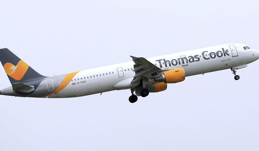 FILE - In this May 19, 2016 file photo, a Thomas Cook plane takes off in England. Thomas Cook, one of the world’s oldest and largest travel companies, is facing a race against time to stay afloat it was announced Friday, Sept. 20, 2019. The debt-laden British-based company has confirmed it is seeking 200 million pounds ($250 billion) in extra funding to avoid its collapse. (Tim Goode/PA via AP, file)