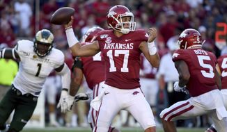 Arkansas quarterback Nick Starkel throws a pass against Colorado State during the second half of an NCAA college football game Saturday, Sept. 14, 2019, in Fayetteville, Ark. (AP Photo/Michael Woods)