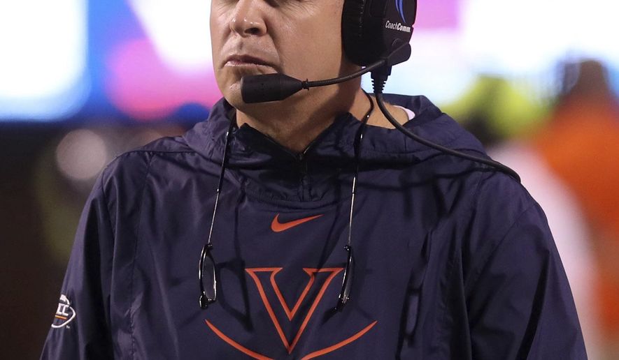 Virginia coach Bronco Mendenhall reacts to a play during the first half of the team's NCAA college football game against Florida State in Charlottesville, Va., Saturday, Sept. 14, 2019. (AP Photo/Andrew Shurtleff)