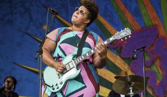 FILE - In this April 29, 2017 file photo, Brittany Howard of Alabama Shakes performs at the New Orleans Jazz and Heritage Festival in New Orleans. Howard&#x27;s personality and songwriting shine through on “Jamie,” the singer and guitarist’s 11-track solo debut.  (Photo by Amy Harris/Invision/AP, File)