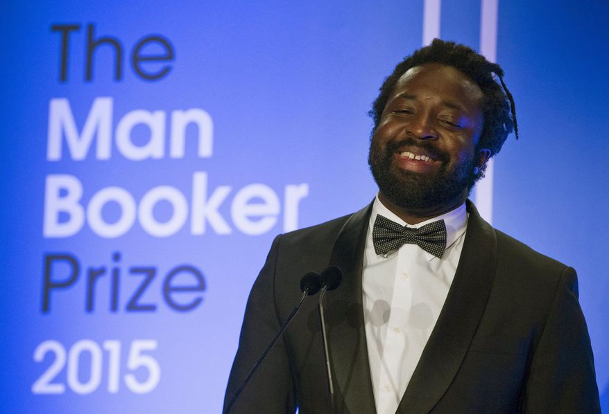 FILE - In this Oct. 13, 2015 file photo, Marlon James, author of "A Brief History of Severn Killings", speaks after being named as the winner of the Man Booker Prize for Fiction 2015, in London. Colson Whitehead’s brutal narrative of a boys’ reform school, “The Nickel Boys,” and James’ fantasy epic “Black Leopard, Red Wolf” are among the works chosen by judges, Friday, Sept. 20, 2019 for the fiction longlist of the National Book Awards. (Neil Hall/Pool via AP, File)