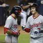Washington Nationals&#39; Adam Eaton, left, congratulates Trea Turner after Turner hit a home run during the third inning of the team&#39;s baseball game against the Miami Marlins, Friday, Sept. 20, 2019, in Miami. (AP Photo/Wilfredo Lee) ** FILE **