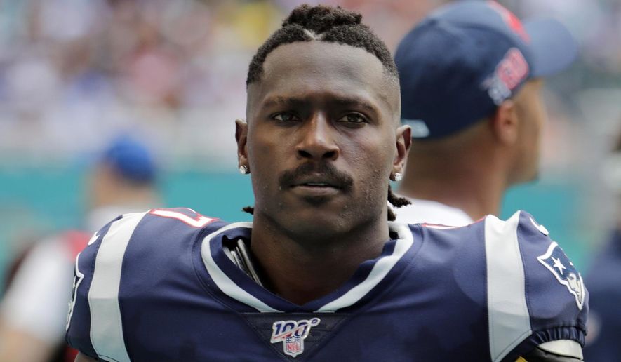 FILE - In this Sunday, Sept. 15, 2019, file photo, New England Patriots wide receiver Antonio Brown (17) on the sidelines,during the first half at an NFL football game against the Miami Dolphins in Miami Gardens, Fla. The Patriots released Brown on Friday, Sept. 20, 2019. (AP Photo/Lynne Sladky, File)