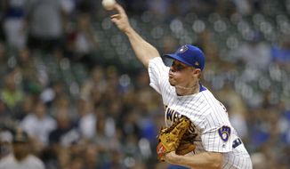 Milwaukee Brewers&#39; Chase Anderson pitches during the first inning of the team&#39;s baseball game against the Pittsburgh Pirates on Friday, Sept. 20, 2019, in Milwaukee. (AP Photo/Aaron Gash)