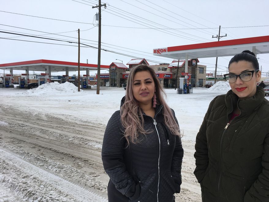 This Jan. 23, 2019 photo released by ACLU of Montana, shows Martha "Mimi" Hernandez, left, and Ana Suda in Havre, Mont. Suda, who is suing the U.S. Customs and Border Patrol after an agent questioned her and Hernandez for speaking Spanish in a convenience store says the backlash has forced them to leave their small Montana city. Suda said Friday, Sept. 20 she has been harassed by other Havre residents in stores and restaurants ever since a video of a Border Patrol agent questioning her and Hernandez was uploaded to YouTube. (Brooke Swaney/ ACLU of Montana via AP)