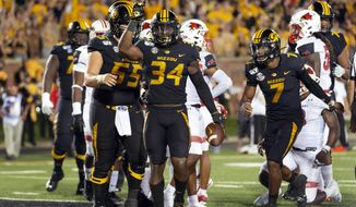 Missouri running back Larry Rountree III (34) celebrates after scoring a touchdown during the second quarter of an NCAA college football game against Southeast Missouri State, Saturday, Sept. 14, 2019, in Columbia, Mo. (AP Photo/L.G. Patterson)