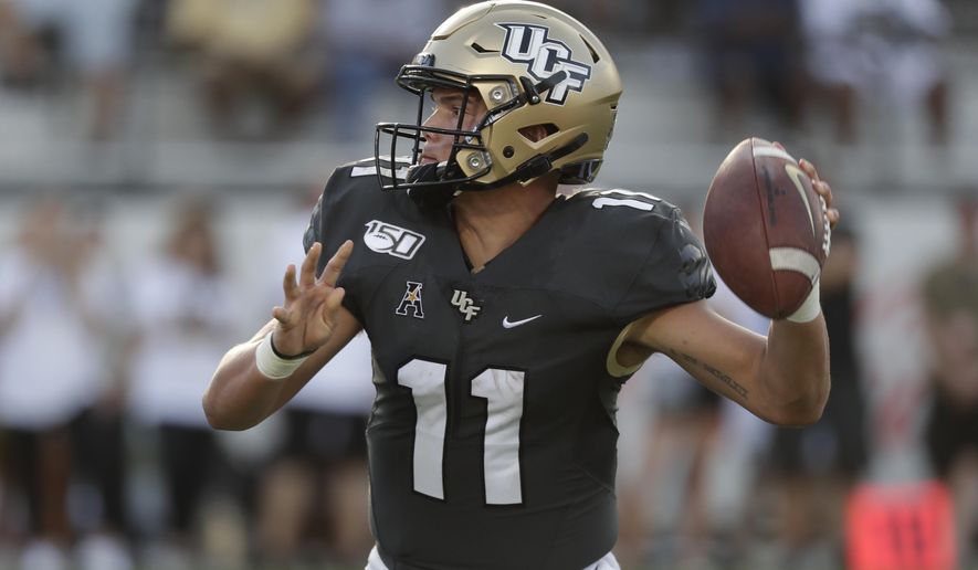 Central Florida quarterback Dillon Gabriel throws a 1-yard touchdown pass against Stanford during the second half of an NCAA college football game, Saturday, Sept. 14, 2019, in Orlando, Fla. (AP Photo/John Raoux)