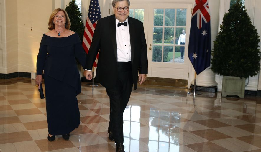 Attorney General William Barr, right, and wife Christine Barr arrive for a State Dinner with Australian Prime Minister Scott Morrison and President Donald Trump at the White House, Friday, Sept. 20, 2019, in Washington. (AP Photo/Patrick Semansky)