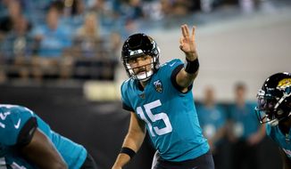 Jacksonville Jaguars quarterback Gardner Minshew (15) calls a play at the line of scrimmage during the first half of an NFL football game against the Tennessee Titans, Thursday, Sept. 19, 2019, in Jacksonville, Fla. (AP Photo/Stephen B. Morton) **FILE**