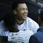 New York Yankees&#39; Giancarlo Stanton celebrates with New York Yankees&#39; Didi Gregorius after hitting a home run against the Toronto Blue Jays during the sixth inning of the team&#39;s baseball game, Saturday, Sept. 21, 2019, in New York. (AP Photo/Michael Owens)