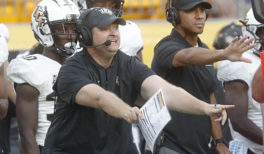 Central Florida head coach Josh Heupel yells instructions to his team during the second half of an NCAA college football game against Pittsburgh, Saturday, Sept. 21, 2019, in Pittsburgh. (AP Photo/Keith Srakocic)
