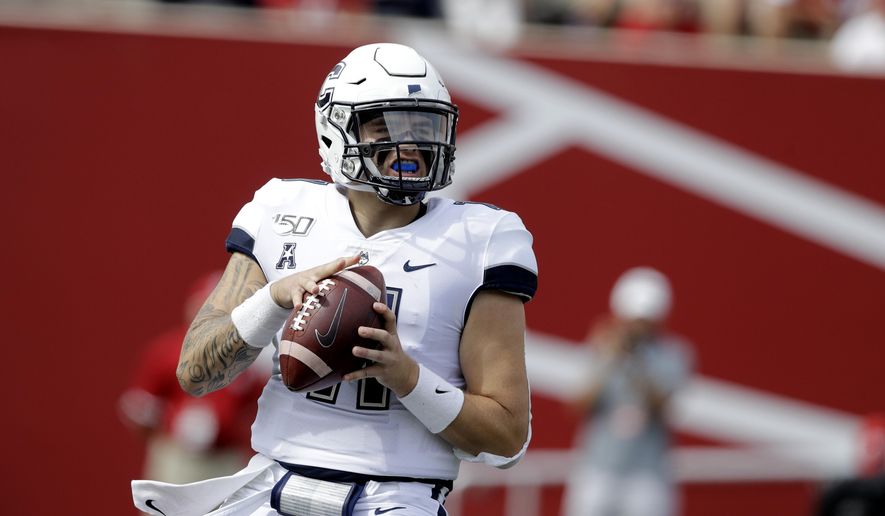 Connecticut quarterback Jack Zergiotis (11) looks to throw during the first half of an NCAA college football game against Indiana, Saturday, Sept. 21, 2019, in Bloomington, Ind. (AP Photo/Darron Cummings)