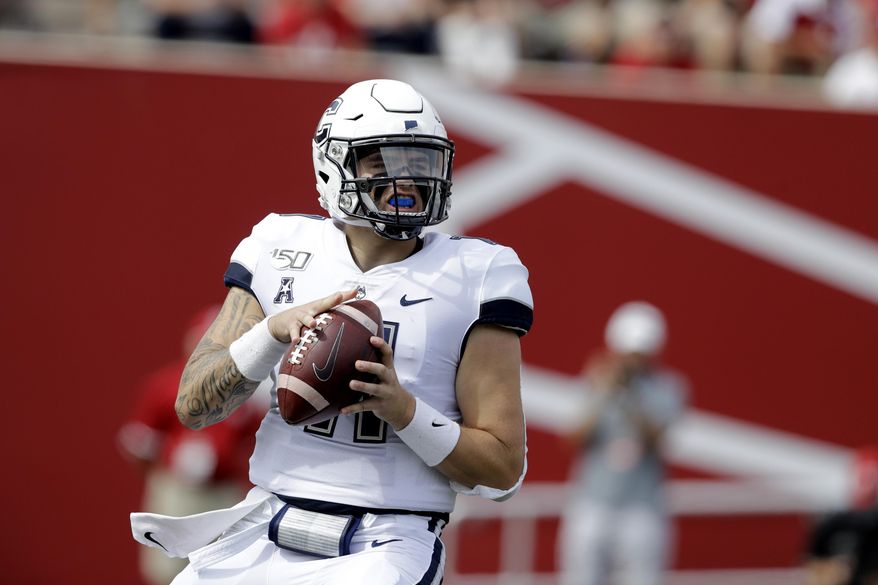 Connecticut quarterback Jack Zergiotis (11) looks to throw during the first half of an NCAA college football game against Indiana, Saturday, Sept. 21, 2019, in Bloomington, Ind. (AP Photo/Darron Cummings)