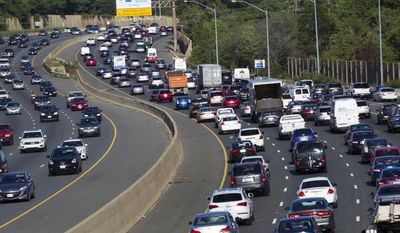 Traffic crawls along the Capital Beltway during rush hour, in Greenbelt, Md., Tuesday, Aug. 25, 2015. (AP Photo/Jose Luis Magana) ** FILE **