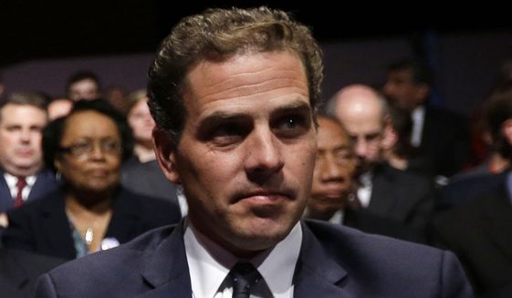 In this Oct. 11, 2012, file photo, Hunter Biden waits for the start of his father&#39;s, Vice President Joe Biden&#39;s, debate at Centre College in Danville, Ky. (AP Photo/Pablo Martinez Monsivais, File) ** FILE **