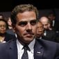 In this Oct. 11, 2012, file photo, Hunter Biden waits for the start of his father&#39;s, Vice President Joe Biden&#39;s, debate at Centre College in Danville, Ky. (AP Photo/Pablo Martinez Monsivais, File) ** FILE **