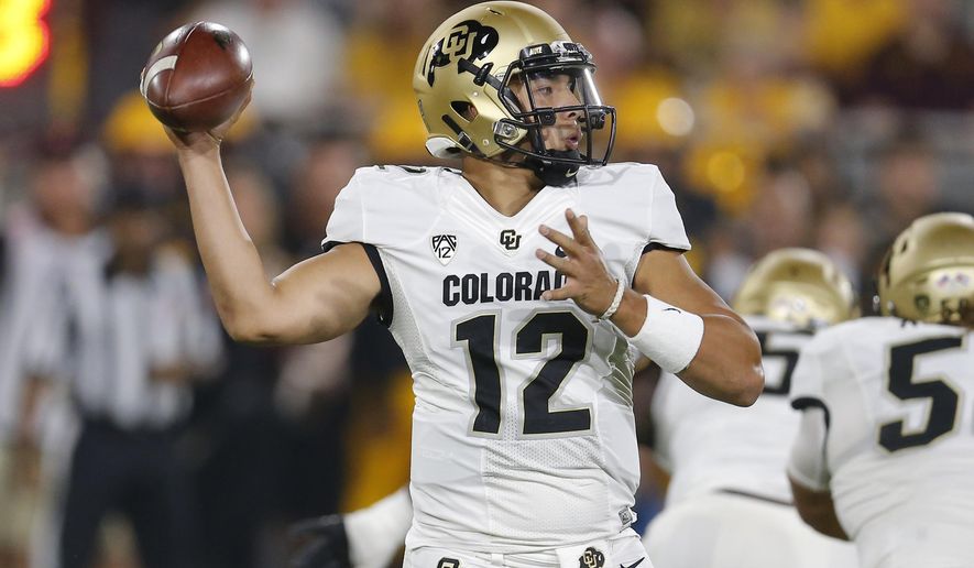 Colorado quarterback Steven Montez (12) throws a pass against Arizona State during the first half of an NCAA college football game Saturday, Sept. 21, 2019, in Tempe, Ariz. (AP Photo/Rick Scuteri)