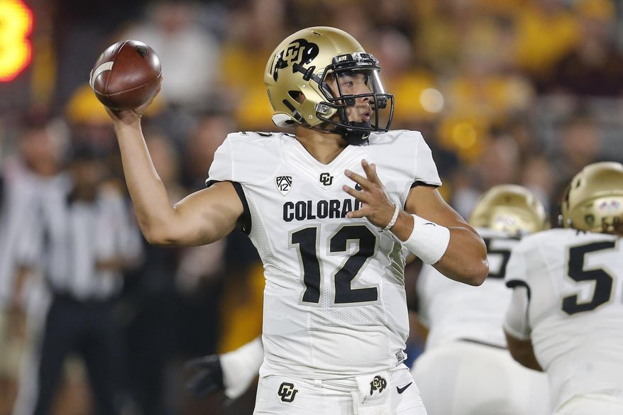 Colorado quarterback Steven Montez (12) throws a pass against Arizona State during the first half of an NCAA college football game Saturday, Sept. 21, 2019, in Tempe, Ariz. (AP Photo/Rick Scuteri)