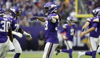 Minnesota Vikings running back Dalvin Cook (33) celebrates after scoring on a 1-yard touchdown run during the first half of an NFL football game against the Oakland Raiders, Sunday, Sept. 22, 2019, in Minneapolis. (AP Photo/Bruce Kluckhohn)