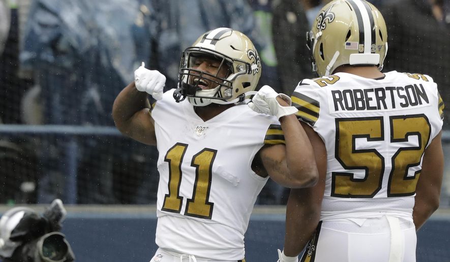 New Orleans Saints&#x27; Deonte Harris (11) celebrates his touchdown on a punt return against the Seattle Seahawks during the first half of an NFL football game Sunday, Sept. 22, 2019, in Seattle. (AP Photo/Ted S. Warren)