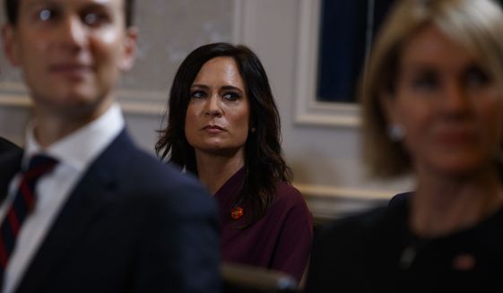 White House press secretary Stephanie Grisham listens during a meeting between President Donald Trump and Pakistani President Ashraf Ghani at the InterContinental Barclay hotel during the United Nations General Assembly, Monday, Sept. 23, 2019, in New York. (AP Photo/Evan Vucci)