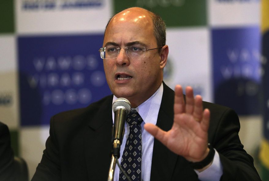 Rio de Janeiro Gov. Wilson Witzel gives a news conference concerning the death of an 8-year-old girl in Rio de Janeiro, Brazil, Monday, Sept. 23, 2019. Ágatha Sales Félix died Friday after she was shot in the back while riding in a van in the Complexo do Alemao slum. (AP Photo/Silvia Izquierdo)